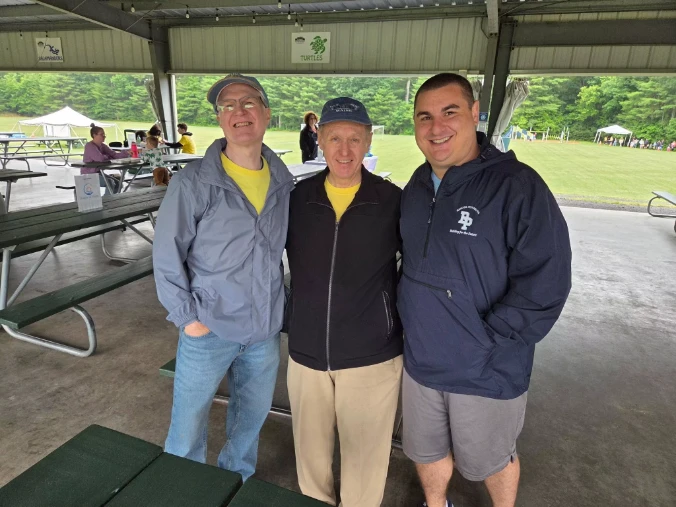 Joe Pacheco with Raynham community members at a local event